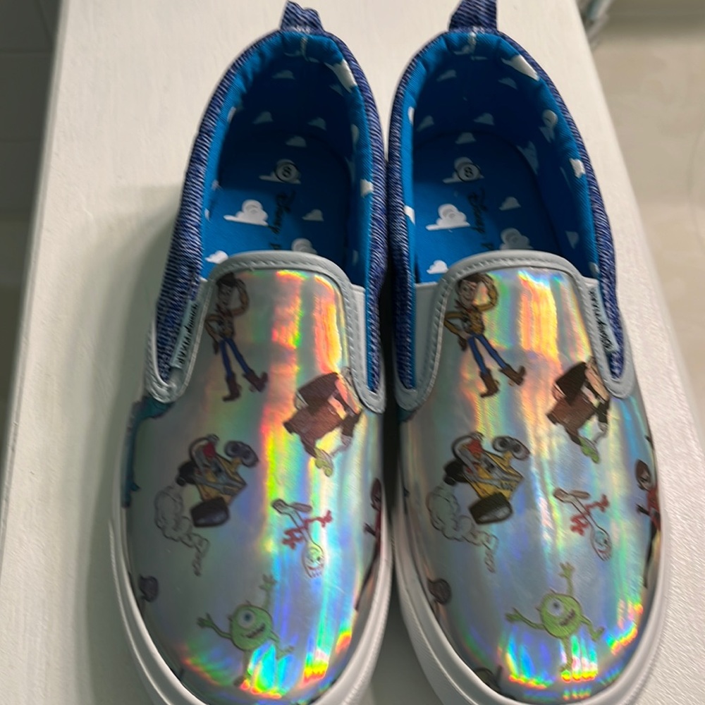 New pair of Disney/Pixar Toy Story shoes. Woman’s size 8 smoke free home